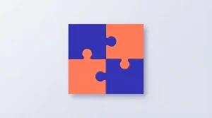 Vier zusammengesetzte Puzzleteile auf einem Tisch.